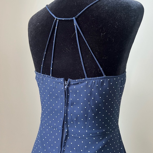 Perfect for the country club! This polka dot ruffled dress is all class. - Picture 4 of 5